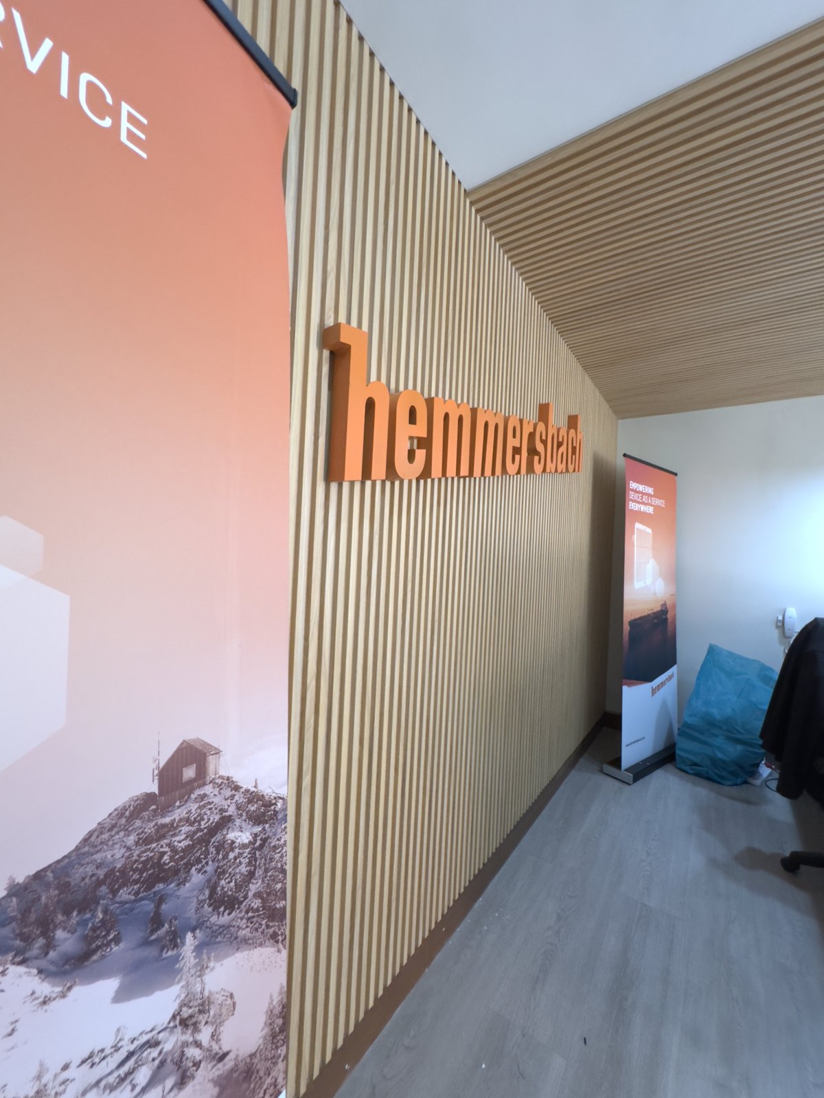 Office service brand wall installed by SurfaceOn